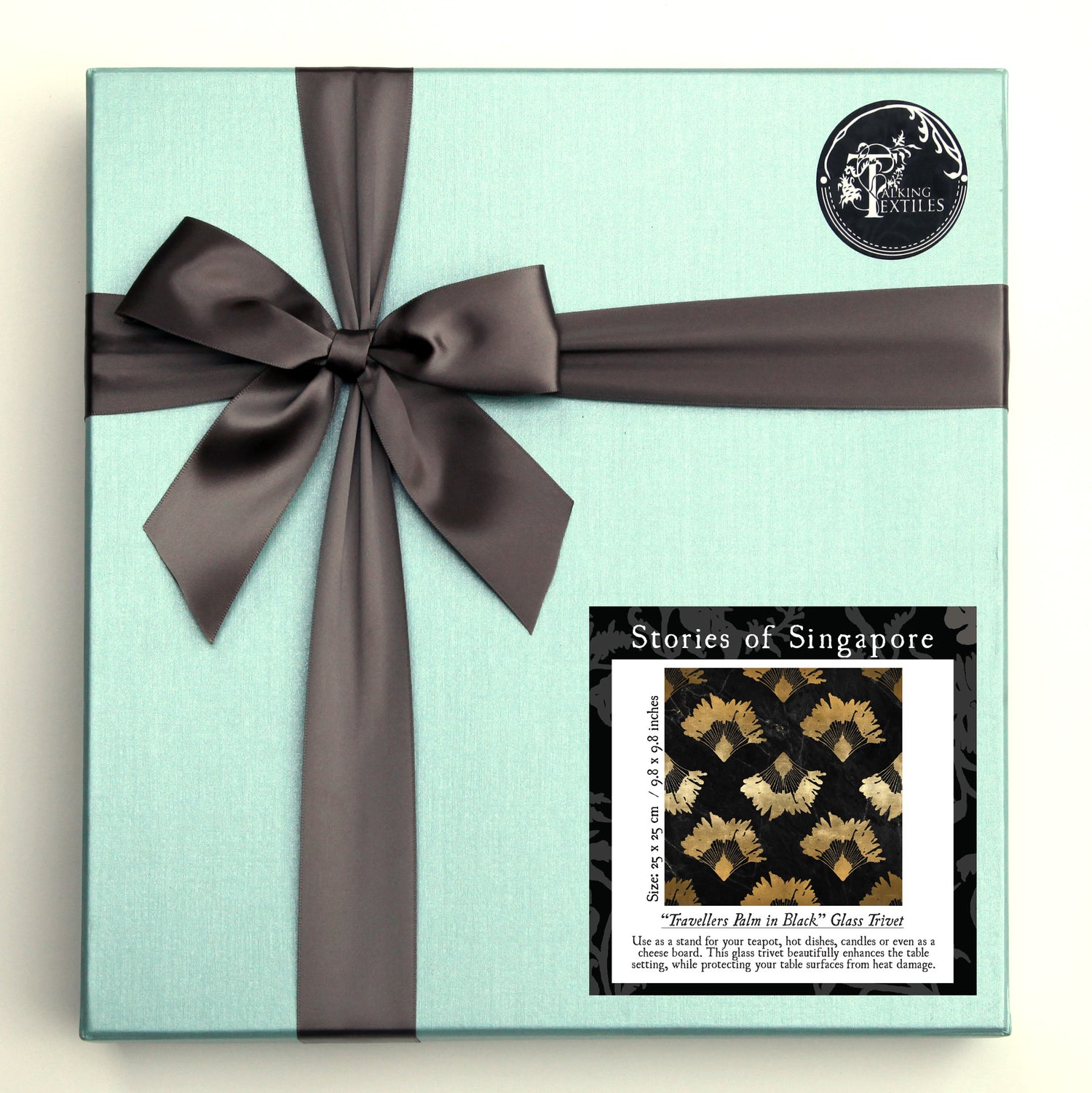Travellers Palm in Black Glass Trivet
